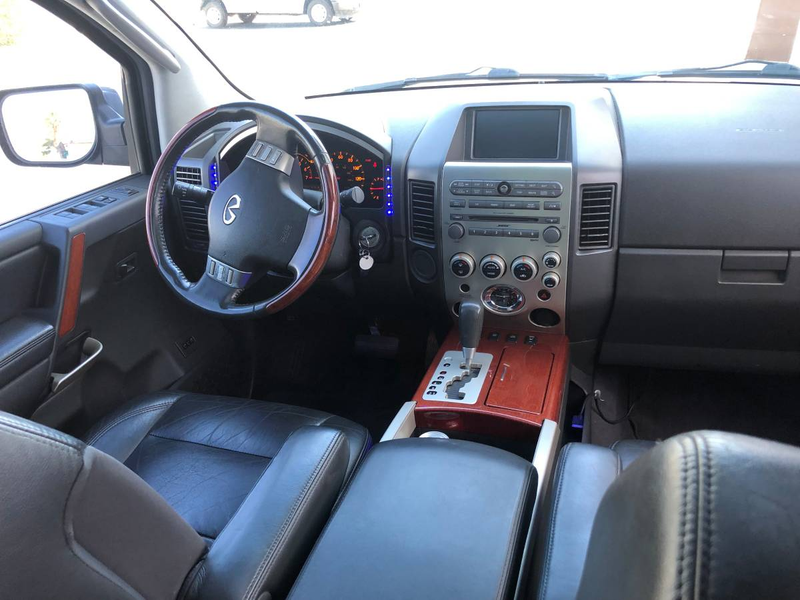 Illustration for article titled At $5,900, Could This 2006 Infiniti QX56 Turn You Into A Wrap Artist?
